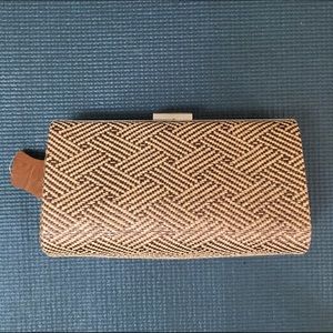 Cute woven clutch. NWOT.