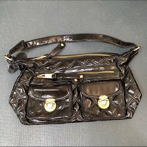 Small black quilted patient purse.