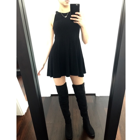 Thigh high flat boots.