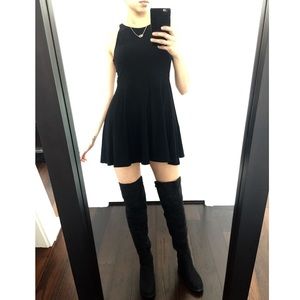 Thigh high flat boots.