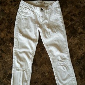 Ripped white skinny jeans