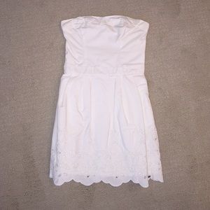 white dress with floral details