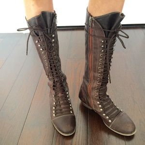 Steve Madden lace up leather boots.