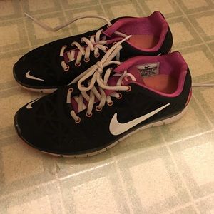 Black and pink Nike Free