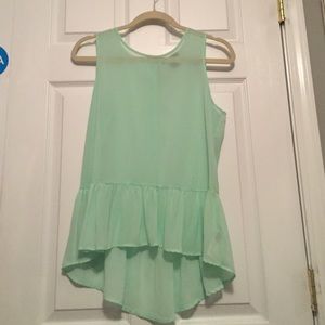 Sea foam green tank with ruffle at bottom.