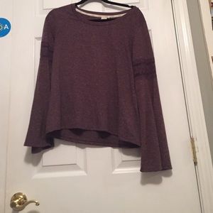 plum colored long sleeve top.