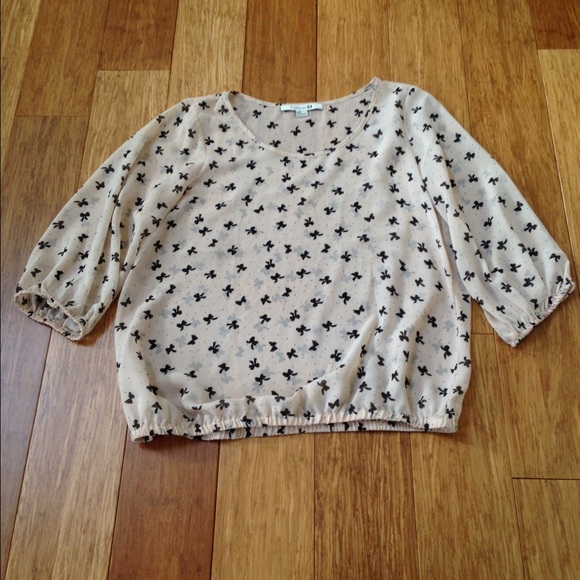 Blouse with little bow ties