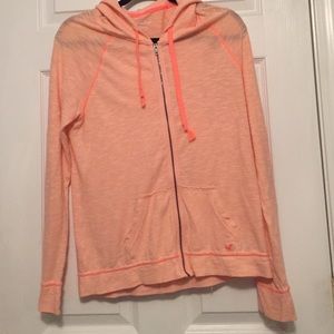neon coral zip up light jacket.
