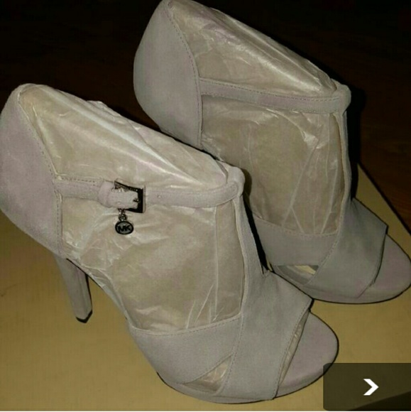 Brand new Michael Kors high heels size 7