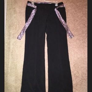 Dress pants with reversible patterned belt.