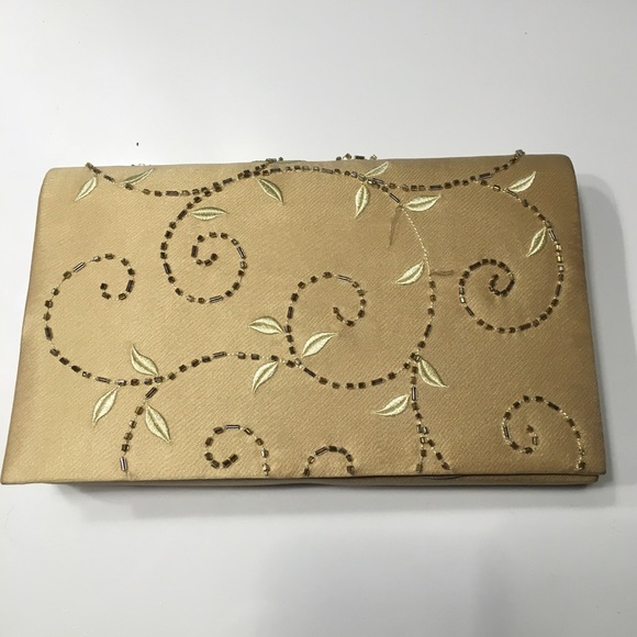 Brand new Gold Satin and beaded clutch