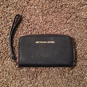 Michael Kors wristlet wallet with cellphone pocket