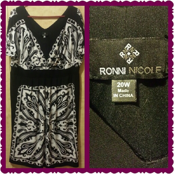 Black and white knee length dress.