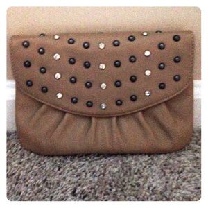 Grace Adele tan clutch