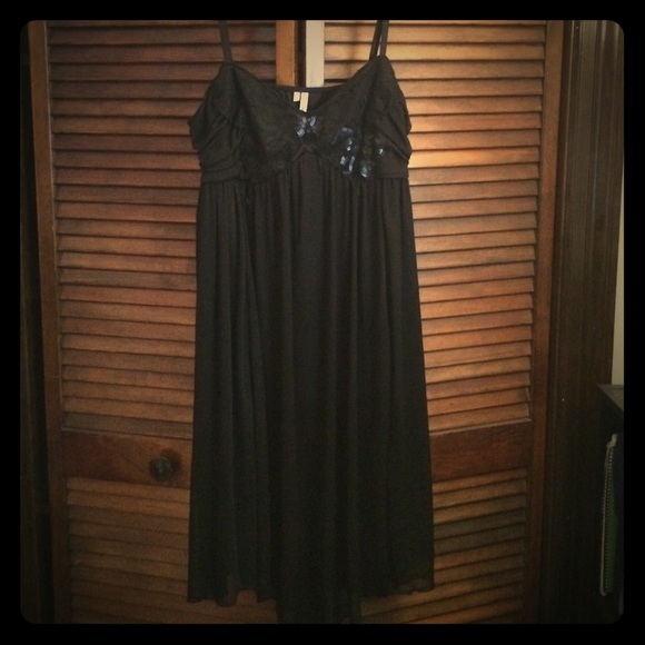 Little black dress with sequin embellishments