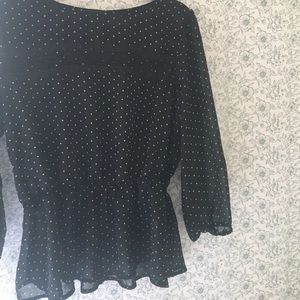 Peplum polka-dot shear top