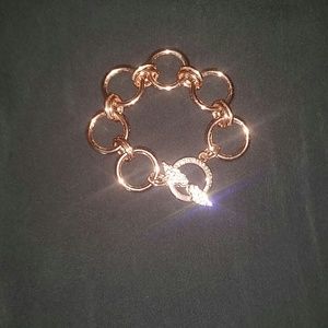 Bronze Victoria Secrets bracelet.