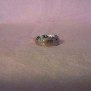 Silver colored superman rings