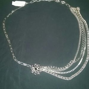 Black and silver necklace .