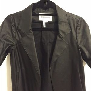 Shirtsleeve faux leather mesh button up shirt.
