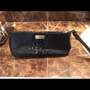 Brahmin wristlets, used as makeup bag.