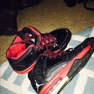 Black and red Jordan's
