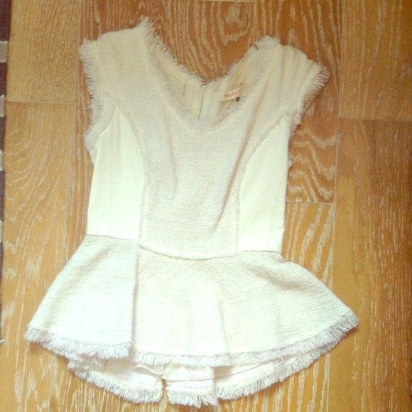 On trend leather and fray top!