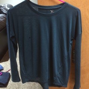 An aqua colored workout shirt (: