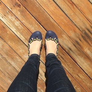 Crocs slip on flats.