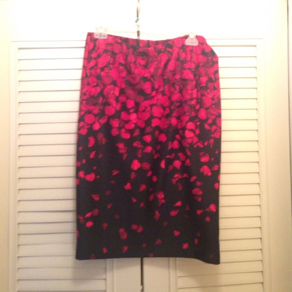 Black skirt with red flower petals