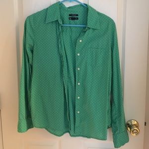 Green with white polka dots button down shirt