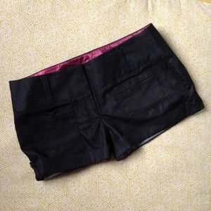 Black high waisted dress shorts.