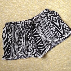 Black and white tribal pattern shorts.