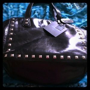 Black leather Cynthia Rowley tote handbag w/ strap