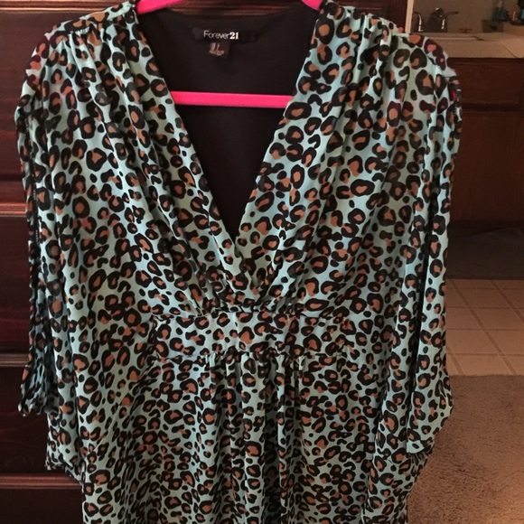 Turquoise and leopard print top or dress.