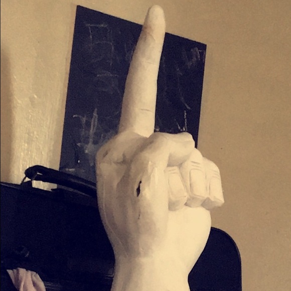 Middle finger statue