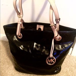 Black Michael Kors bag with nude/beige strap