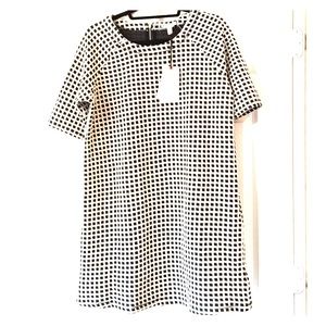 Lila rose black and white pattern dress.