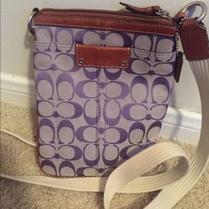 Purple Coach crossbody bag with light brown trim