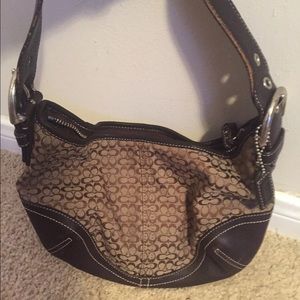 Brown leather and canvas Coach purse