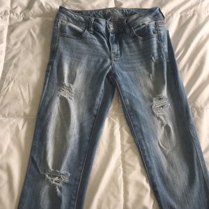 American Eagle light wash destroyed jeggings