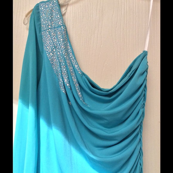 One shoulder dress with shear sleeve.