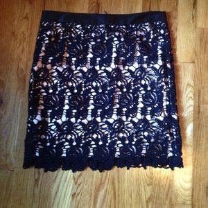 Cream satin skirt with black flower overlay