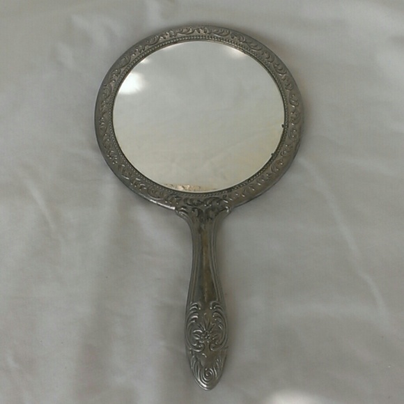 Vintage sliver beauty mirror