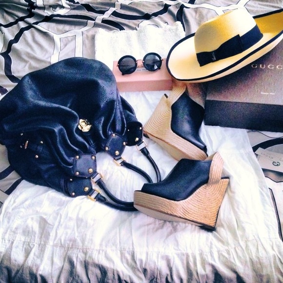 Sold on eBay.  Miu Miu round black sunglasses - Picture 2 of 4