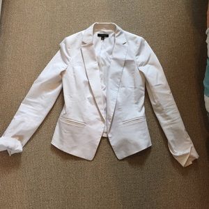 Classic one-button white blazer