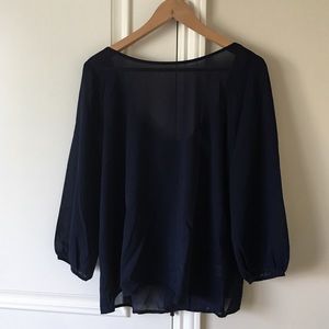 Blue semi-sheer blouse with bow back