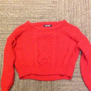 Long sleeve cropped knit sweater.