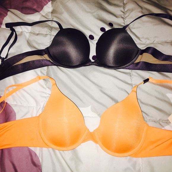 Two Victoria Secret bras, one new with tags.