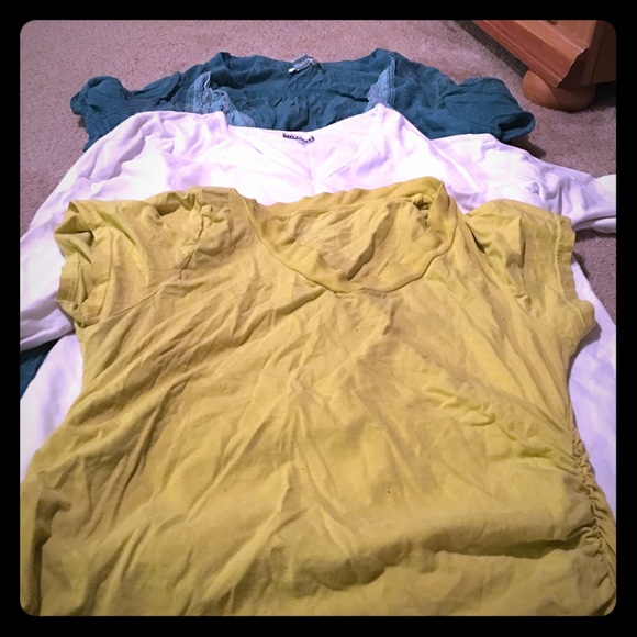 3 shirts green white and yellow